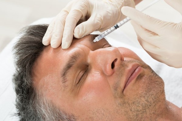Dermal filler on man